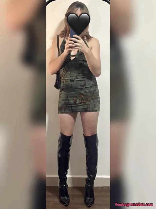 Short dress, tall boots, maximum confidence — crossdressing